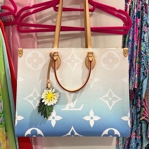 Authentic Louis Vuitton On The Go tote new never used comes dust bag